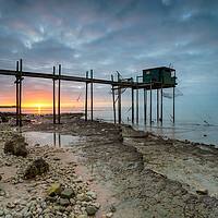 Buy canvas prints of Sunset over fishing carrelets at Marsilly  by Helen Hotson