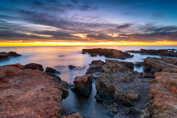 Dawn over the beach at la Torre de la Sal on the Castellon coast Picture Board by Helen Hotson