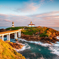 Buy canvas prints of The beautiful Illa Pancha and it's lighthouse at Ribadeo  by Helen Hotson