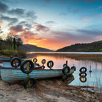 Buy canvas prints of Beautiful sunrise over boats at Glencar Lough by Helen Hotson