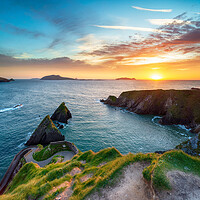Buy canvas prints of Beautiful sunset over Dunquin Pier by Helen Hotson