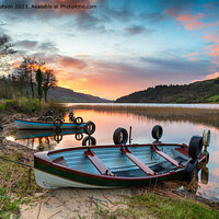 Buy canvas prints of Beautiful sunrise over rowing boats at Glencar Lough by Helen Hotson