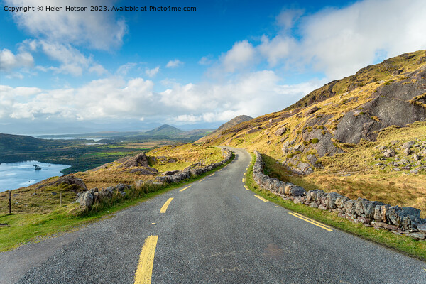 The single track road winding through the Healy Pass Picture Board by Helen Hotson