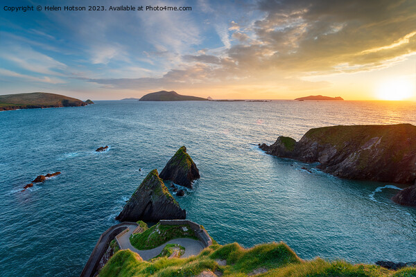 Sunset over Dunquin Pier near Dingle  Picture Board by Helen Hotson