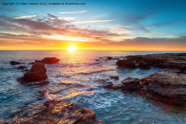 Stunning sunrise over the beach at Torre de la Sal Picture Board by Helen Hotson