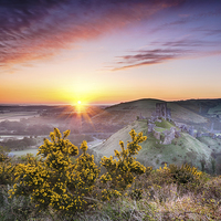 Buy canvas prints of Sunrise at Corfe Castle by Helen Hotson