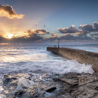 Buy canvas prints of Sunset Rays over Porthleven Pier by Helen Hotson