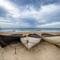 Buy canvas prints of Boats On A Sandy Beach by Helen Hotson