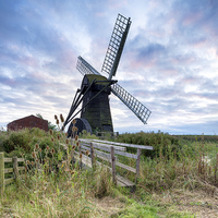 Buy canvas prints of Sunset at Herringfleet Windmill by Helen Hotson
