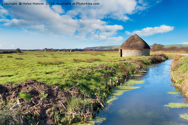 A thatched circular linhay or barn on Braunton Mar Picture Board by Helen Hotson