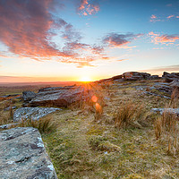 Buy canvas prints of Stunning sunset over slabs of granite rocks at the by Helen Hotson