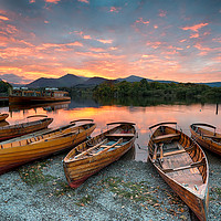 Buy canvas prints of Stunning sunset over wooden rowing boats on Derwen by Helen Hotson