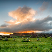 Buy canvas prints of Dramatic Sunrise over Castlerigg Stone Circle by Helen Hotson