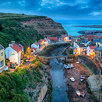Buy canvas prints of Nightfall over Staithes by Helen Hotson