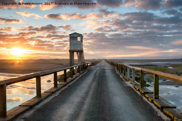 Sunrise over Holy Island Picture Board by Helen Hotson