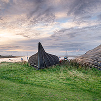 Buy canvas prints of Boathouses at Lindisfarne by Helen Hotson