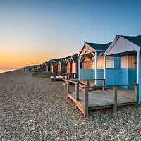Buy canvas prints of Sunset over Beach Huts by Helen Hotson