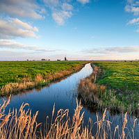 Buy canvas prints of Looking out over Halvergate Marshes to Mutton's Mi by Helen Hotson