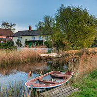 Buy canvas prints of Boats and cottages on the river at West Somerton by Helen Hotson