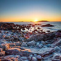Buy canvas prints of Sunset over the rocky beach at Mealista  by Helen Hotson