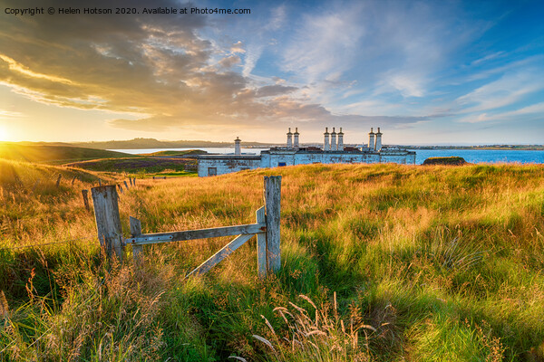 Sunset over the old coastguard cottages at Arnish Point Picture Board by Helen Hotson
