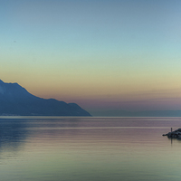 Buy canvas prints of Chillon Castle by the lake at sunrise by Olavs Silis
