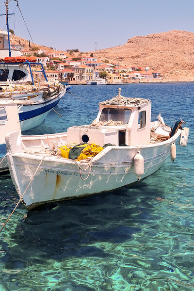 Halki Greek Island White Boat Picture Board by Antony McAulay