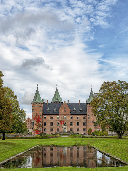 Trolleholm Castle with Autumn Colours Picture Board by Antony McAulay