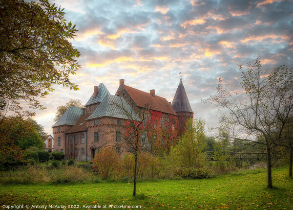 Ortofta Castle with Autumn Colours at Sunset Picture Board by Antony McAulay