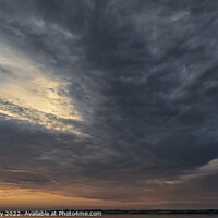 Buy canvas prints of Faro Island Sunset Dramatic Sky by Antony McAulay