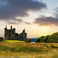 Buy canvas prints of Kilchurn Castle Sunset Facade by Antony McAulay