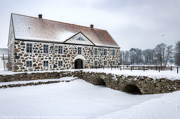 Hovdala Castle in a Winter Wonderland Picture Board by Antony McAulay