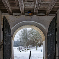 Buy canvas prints of Hovdala Slott Gatehouse Arch in Winter by Antony McAulay