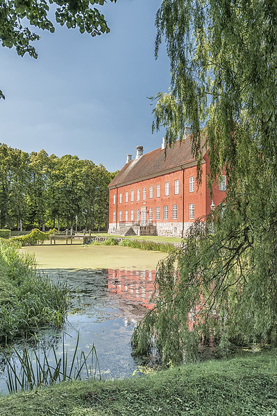 Hviderup Slott with reflection in moat. Picture Board by Antony McAulay