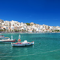 Buy canvas prints of Sitia Seafront with boats by Antony McAulay