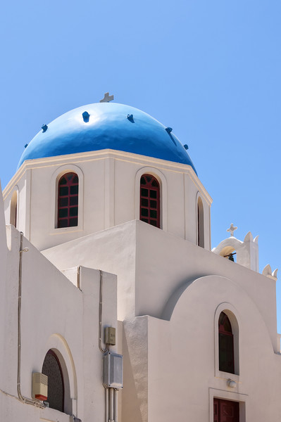 Santorini Church in Oia Village Picture Board by Antony McAulay