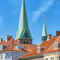 Buy canvas prints of Helsingor Church Behind Buildings by Antony McAulay