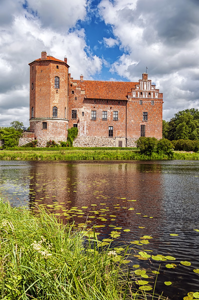 Torups Castle with Reflection Picture Board by Antony McAulay