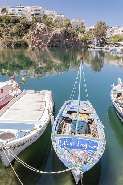 Agios Nikolaos Blue Lagoon Boat Picture Board by Antony McAulay