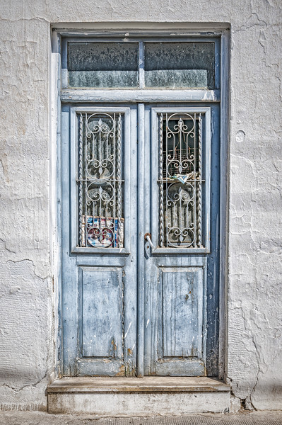 Old Blue Door on Crete Picture Board by Antony McAulay