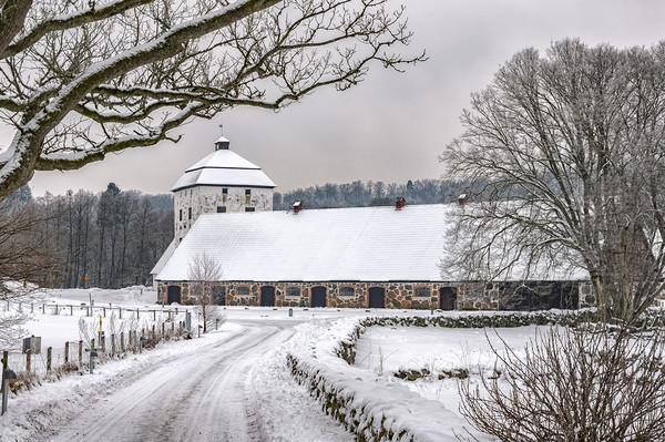 Hovdala Castle Stables in Winter Picture Board by Antony McAulay