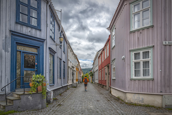 Trondheim Narrow Street with Backpacker Picture Board by Antony McAulay