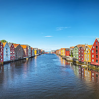 Buy canvas prints of Trondheim River Nidelva Dockside Warehouses by Antony McAulay