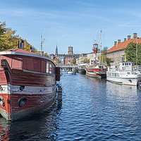 Buy canvas prints of Copenhagen Canal Scene with Red Barge by Antony McAulay