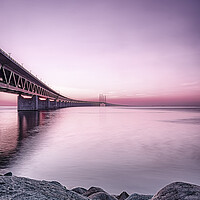 Buy canvas prints of Oresunds Bridge at Sunset in Purple by Antony McAulay