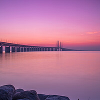 Buy canvas prints of Oresunds Bridge at a Purple Haze Sunset by Antony McAulay