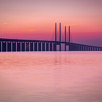 Buy canvas prints of Oresunds Bridge at a Tranquil Sunset by Antony McAulay