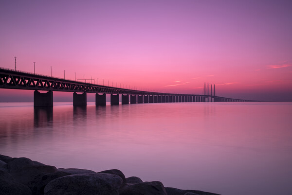 Oresunds Bridge at Sunset with Panoramic Shoreline Picture Board by Antony McAulay