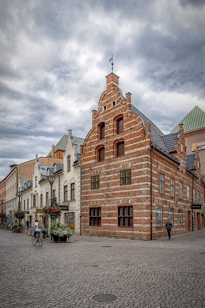 Malmo Street Scene with Old Corner Building Picture Board by Antony McAulay