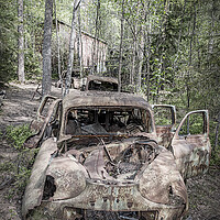 Buy canvas prints of Kirkoe Mosse Bilkyrkogard Rusting Cars by Antony McAulay